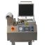 Automatic film cutting vacuum packaging and fitting vacuum packaging machine